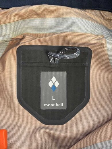 商品画像：1131313 ストームバイカー/セットアップ/L/オレンジ1131313/全体に黒いシミ有り/モンベル 3