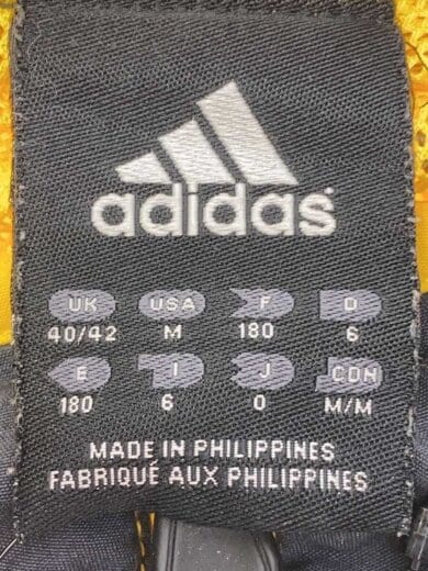 商品画像：00s/スタンドカラーナイロンジャケット/O/イエロー×ネイビー/ドローコード/745519 3