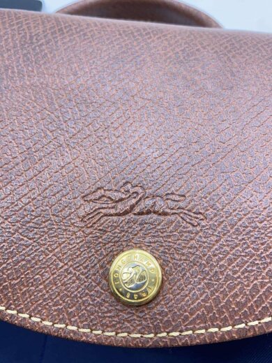 画像：LONGCHAMPリュック/PVC/NVY/無地/16990895565