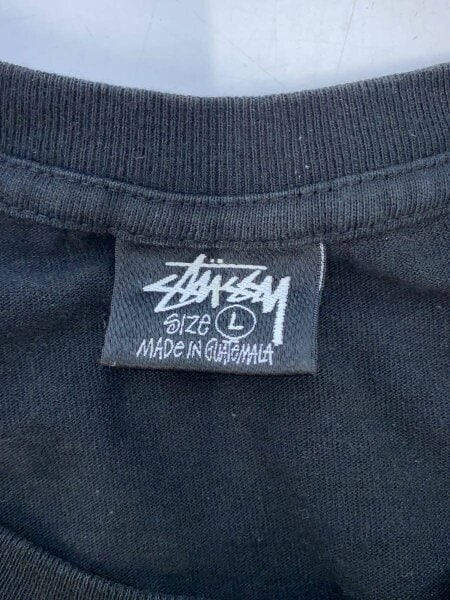STUSSY(ステューシー) / サーフマンTシャツ/L/コットン/BLK// | 古着の