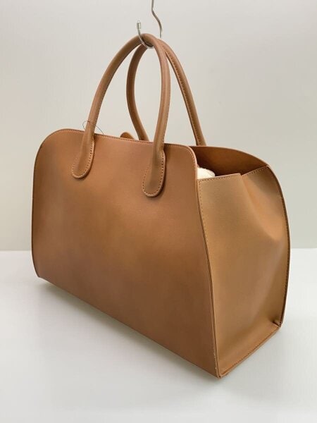 新品未使用✨ミラオーウェン 巾着付きラージボストンバッグ　ブラウン Mila Owen（ミラオーウェン）の「巾着付きラージボストンバッグ